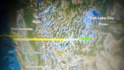Slide showing a map of the United States with labeled locations including San Francisco, Sacramento, Reno, Salt Lake City, Provo, Las Vegas, and California, along with a flight path trajectory across the map
