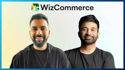 Image showing Divyaanshu Makkar, and Vikas Garg, co-founders of WizCommerce, with WizCommerce branding